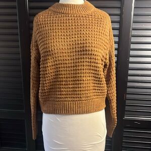 Caramel color sweater.